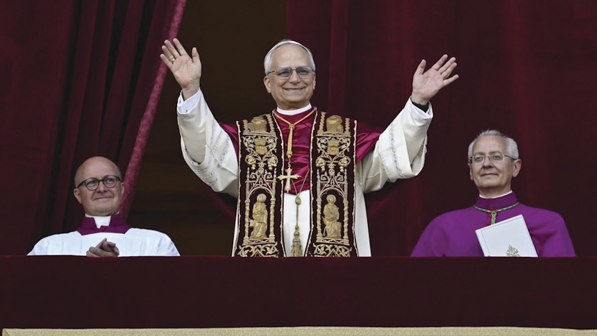 Pope Leo XIV, the former Cardinal Robert F. Prevost, waves to the crowds in St. Peter’s Square at the Vatican after his election as pope May 8, 2025. The new pope was born in Chicago.  (CNS photo/Vatican Media)